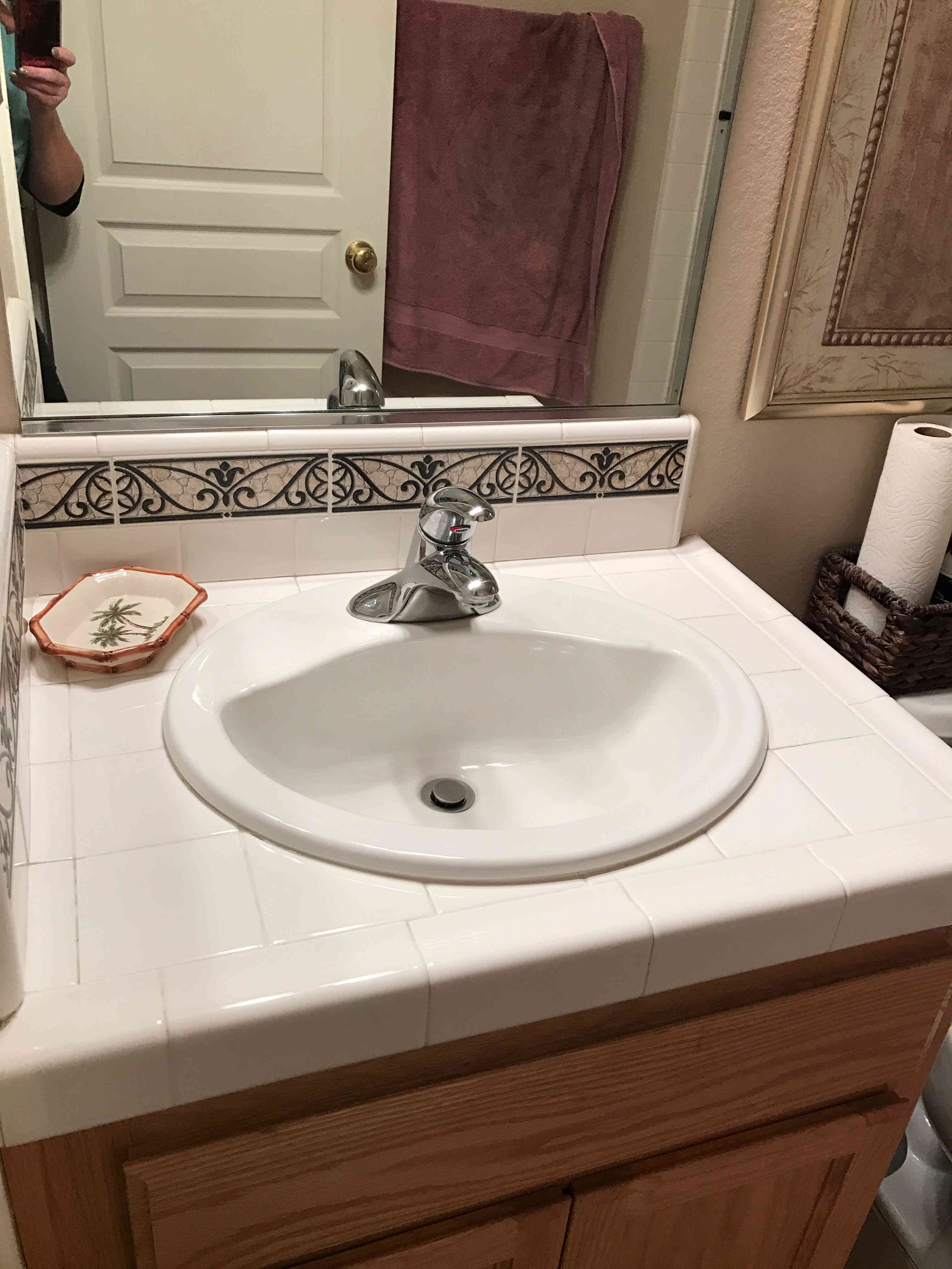 bathroom sink after being cleaned