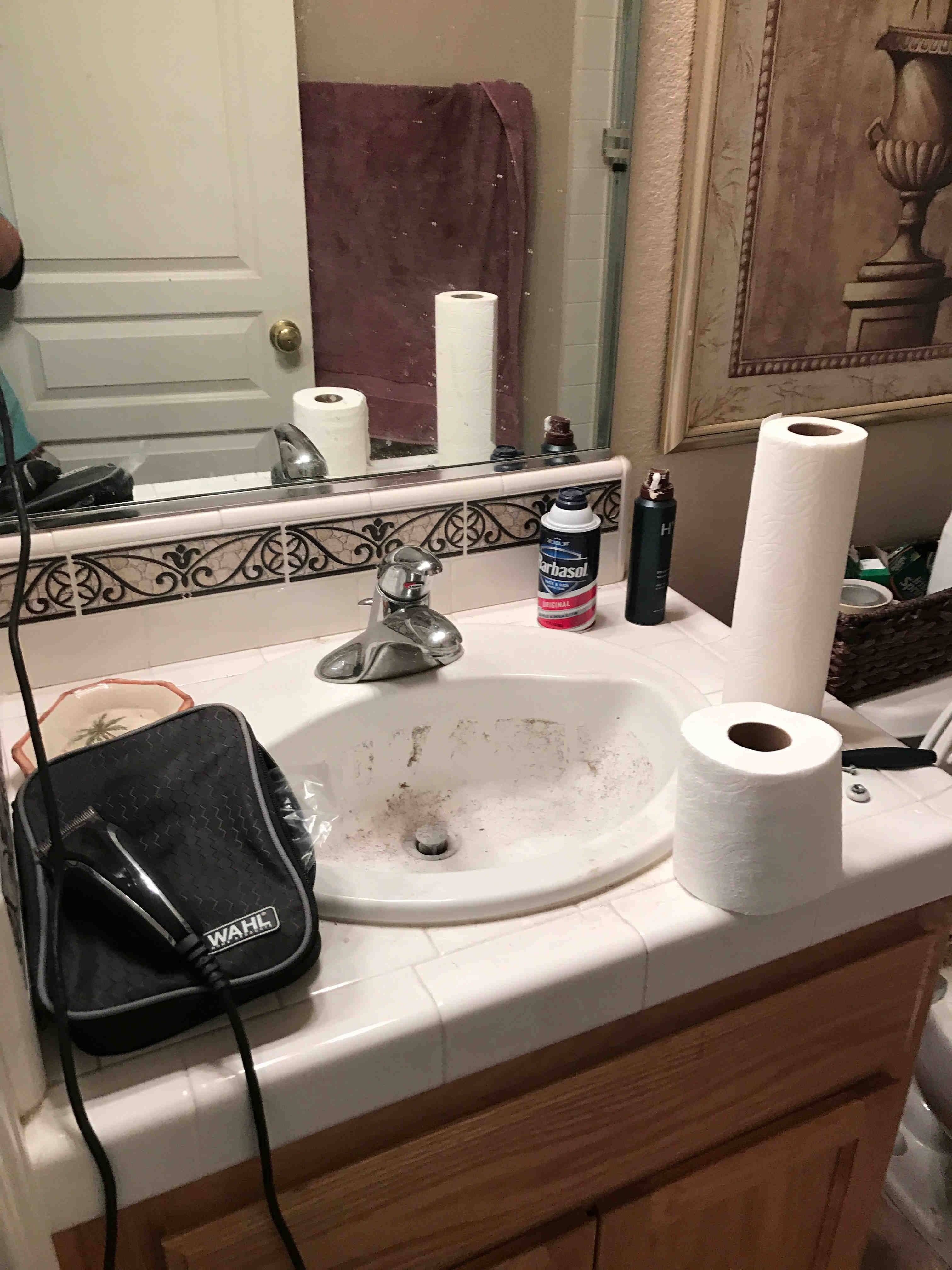 bathroom sink before being cleaned